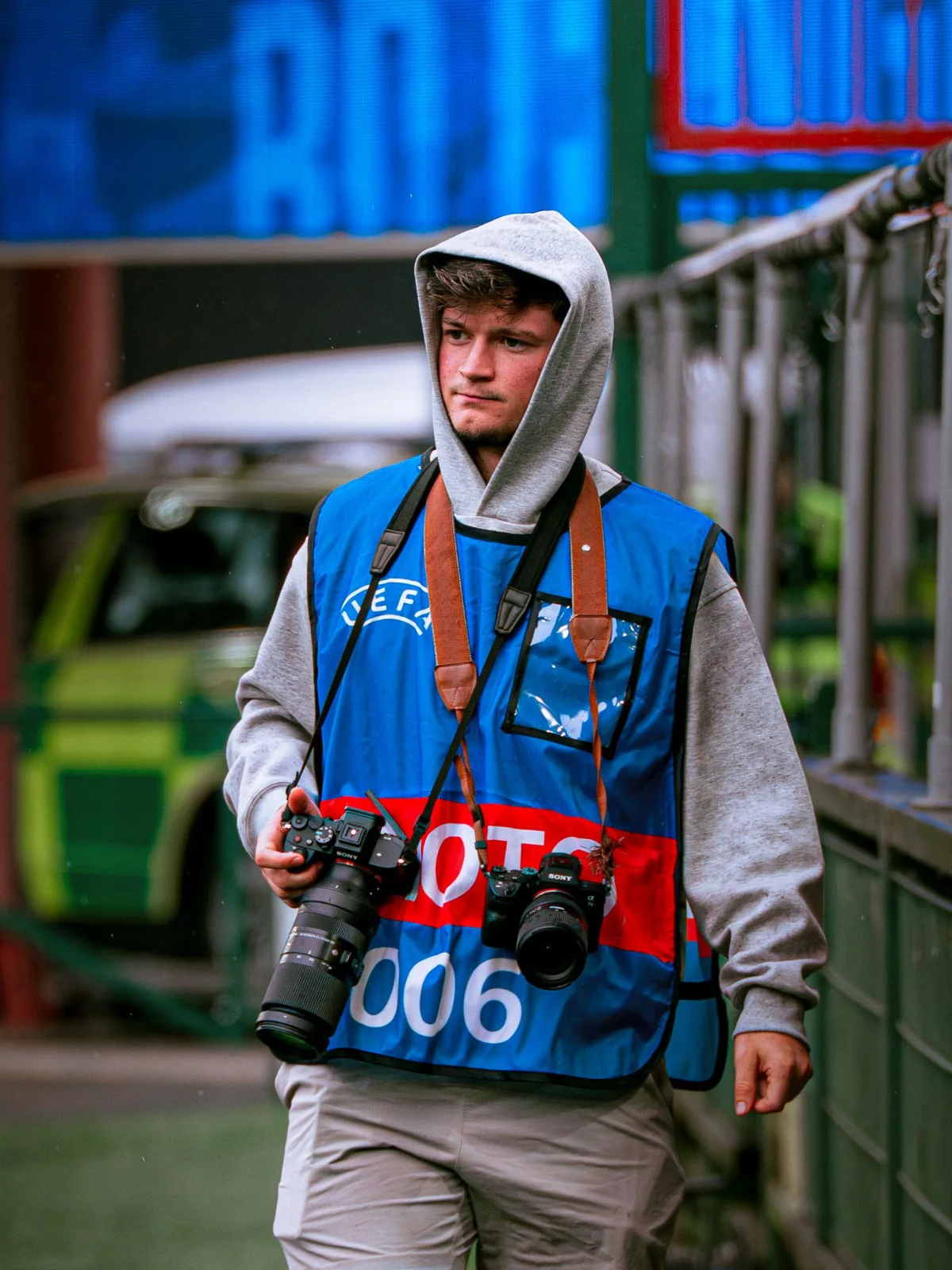 Yuno, photographe sportif, au bord du terrain